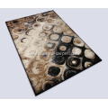 Microfiber tufted carpet with abstract design